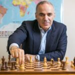 Garry Kasparov gives a chess lesson for children, at the opening of the Superbet Chess Classic Romania 2021 chess tournament